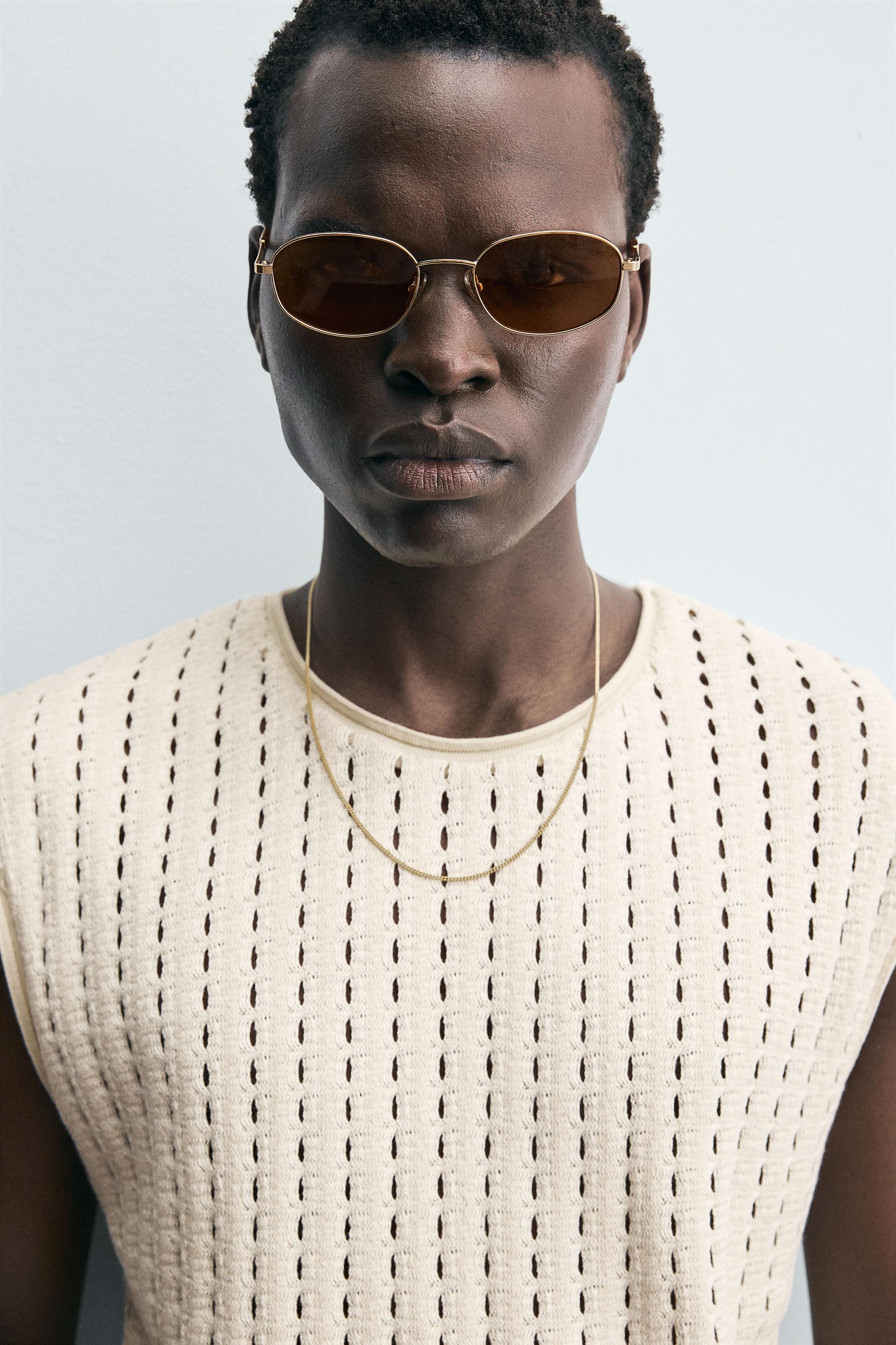 SLEEVELESS KNIT T-SHIRT